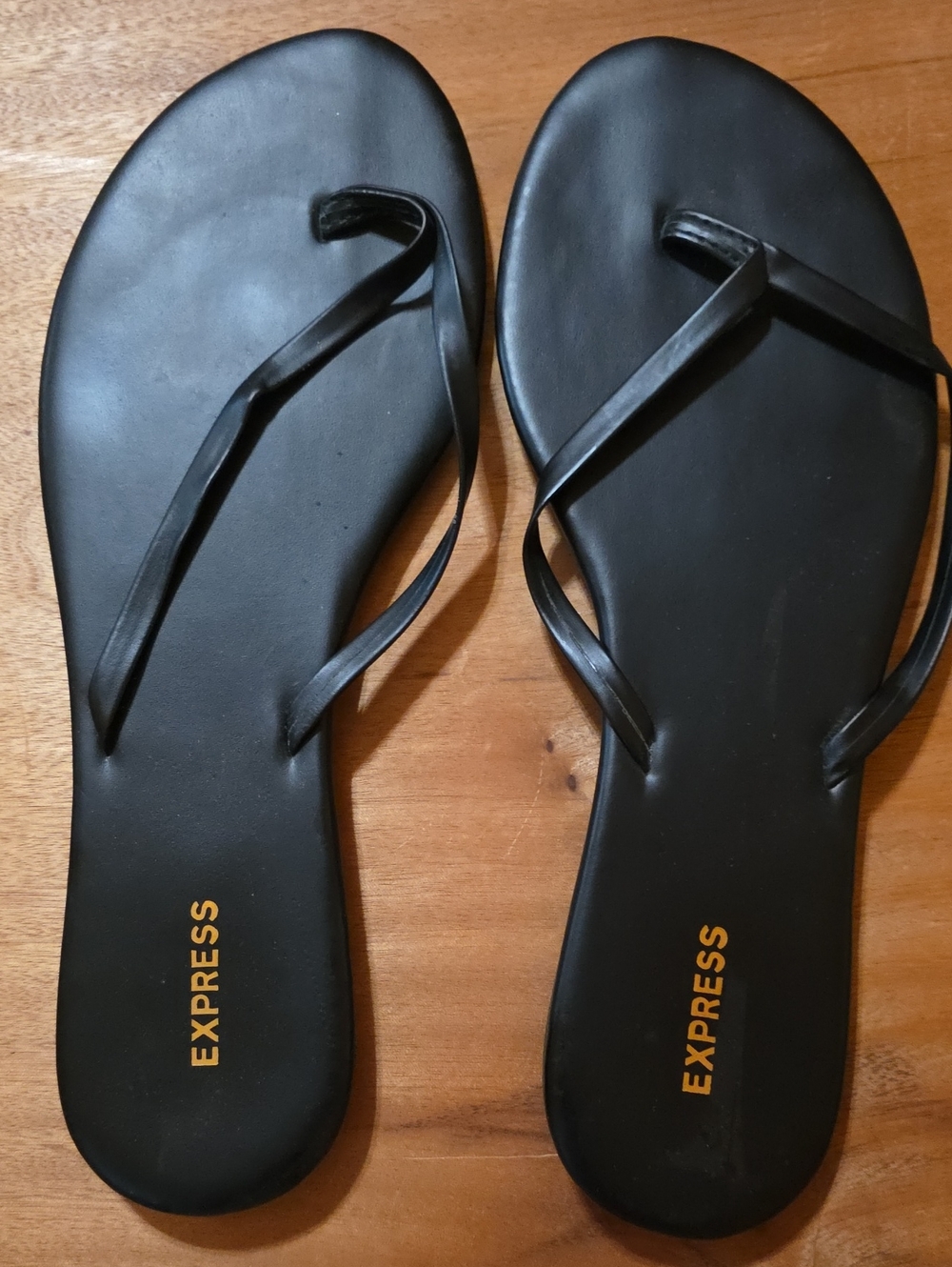Express Black Flip Sandals with Gold Logo